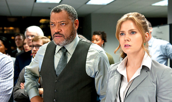 Laurence Fishburne and Amy Adams as The Daily Planet's Perry White and Lois Lane.