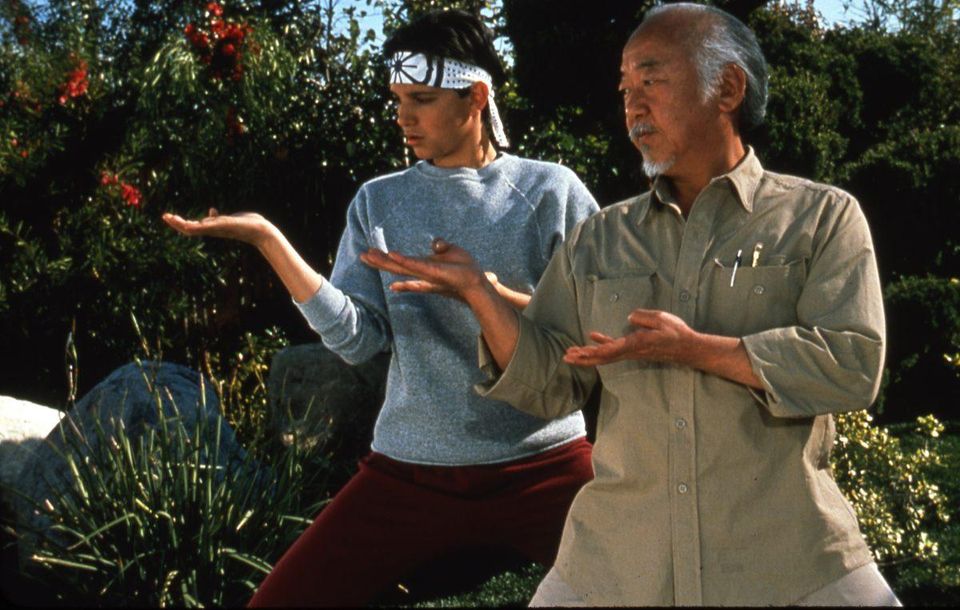 Daniel LaRusso and Mr. Miyagi training in the classic 80s family film the Karate Kid
