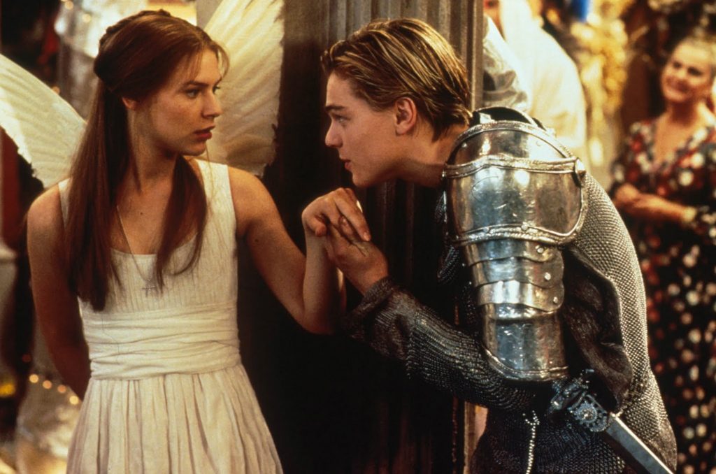 Claire Danes and Leonardo DiCaprio play the most famous of all star-crossed lovers in Baz Luhrmann's adaptation of William Shakespeare's Romeo and Juliet (1996) - Our Top 9 Romantic Films