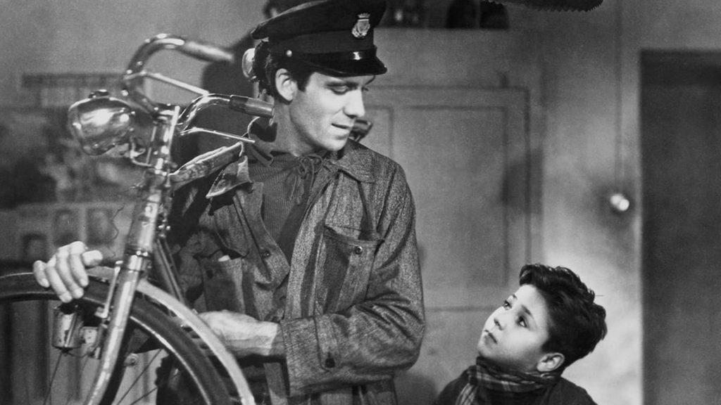 Father and son Antonio and Bruno played by Lamberto Maggiorani and Enzo Staiola in Bicycle Thieves