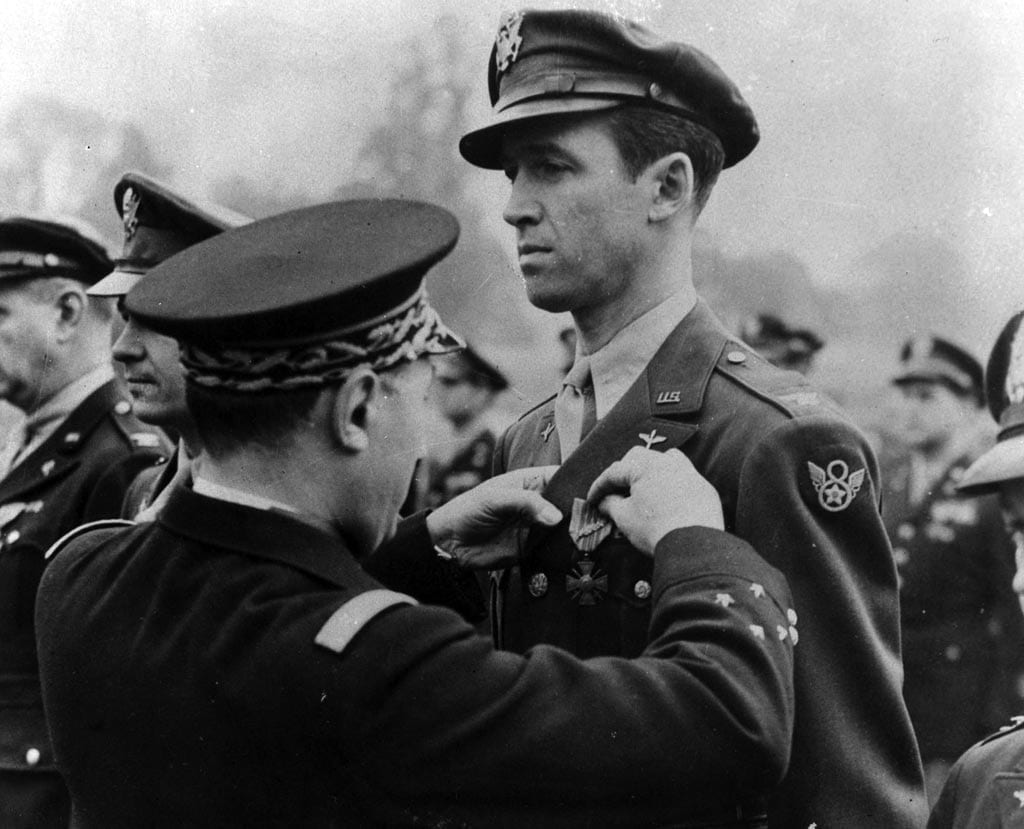 James Stewart receives a medal for bravery.