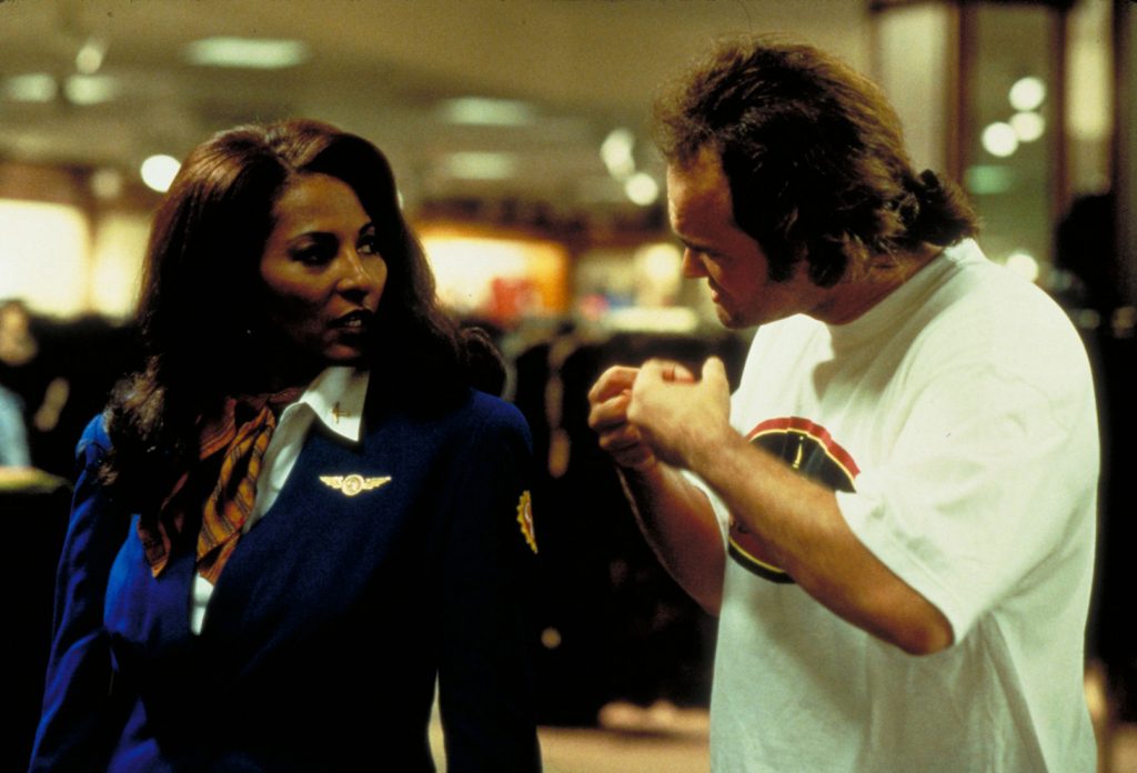 Pam Grier and Quentin Tarantino on set furing the shoot for Jackie Brown