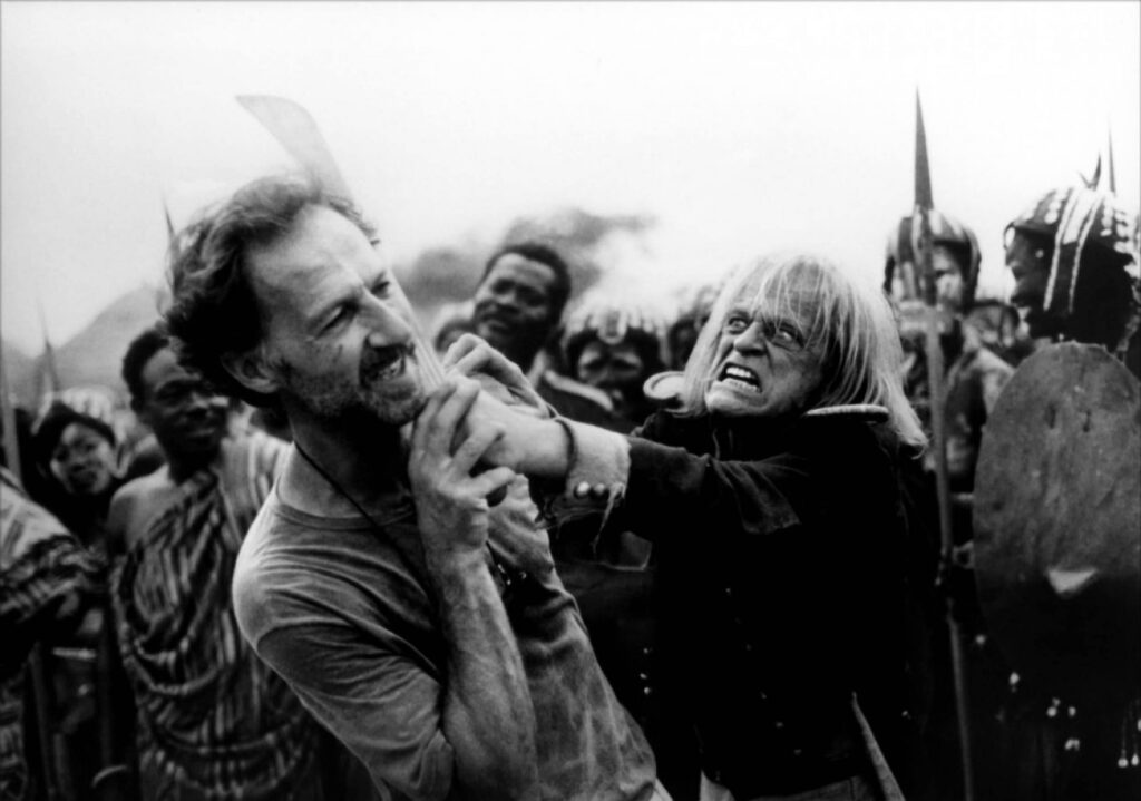 Werner and his best fiend Klaus Kinski enjoy a laugh together during the filmming of The Cobra Verde (1987)