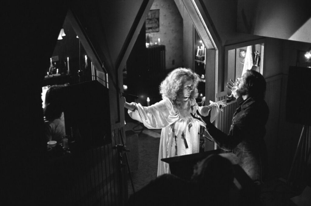 Piper Laurie and Brian De Palma on the set of Carrie (1976)