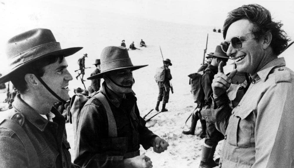 Mel Gibson and Peter Weir on the set of Gallipoli (1981)