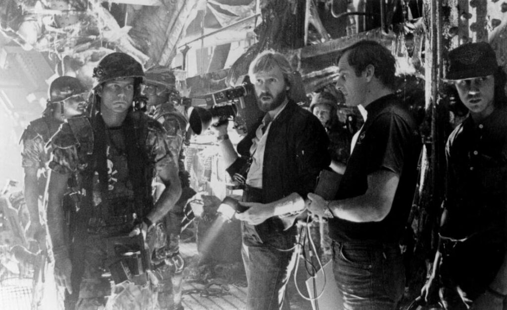 Bill Paxton and James Cameron during the filming of Aliens (1986)