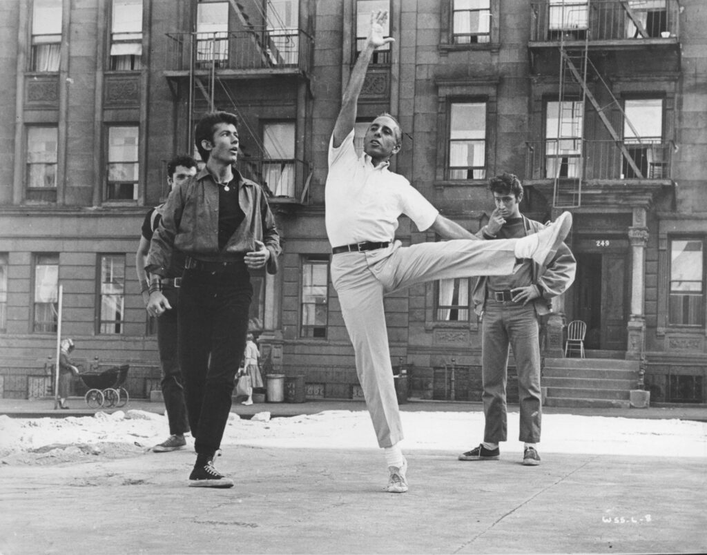Co-director and choreographer Jerome Robbins on set with George Chakiris during the making of West Side Story (1961)
