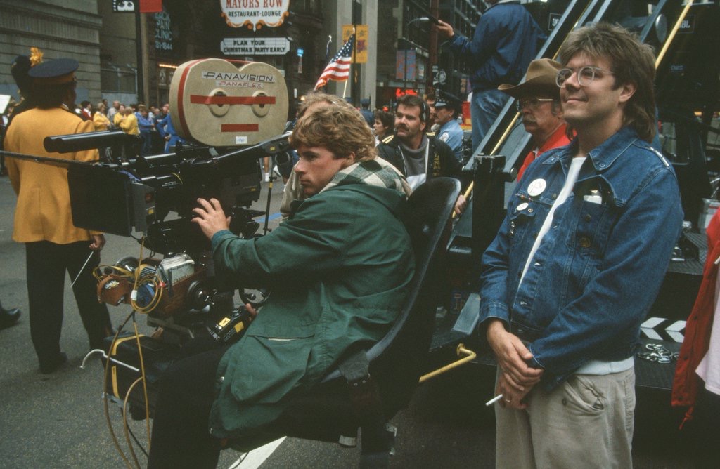 John Hughes on location filming the carnival scene in Ferris Bueller's Day Off (1986)