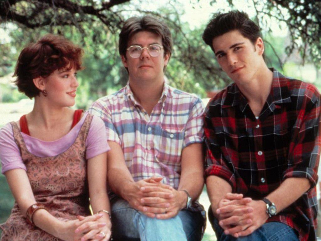 Molly Ringwald, John Hughes and Michael Schoeffling during the making of Sixteen Candles (1984)