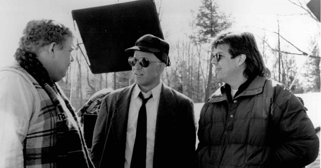 John Candy, Steve Martin and John Hughes on set during the making of Planes, Trains and Automobiles (1987)