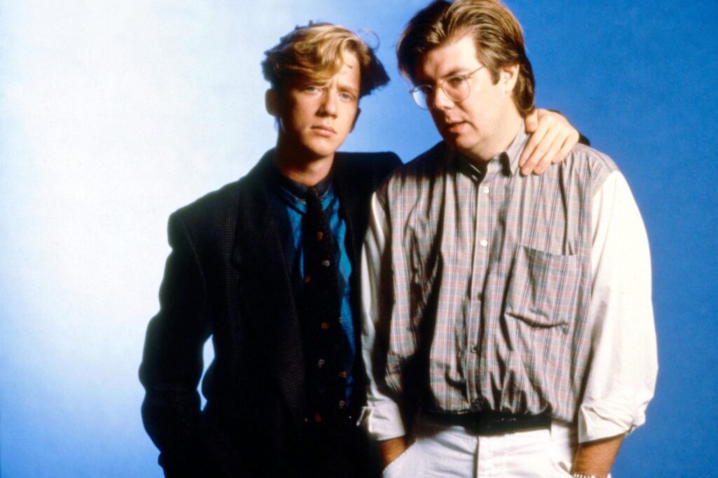 Anthony Michael Hall and John Hughes pose for a promotional still during the making of Wird Science (1985)