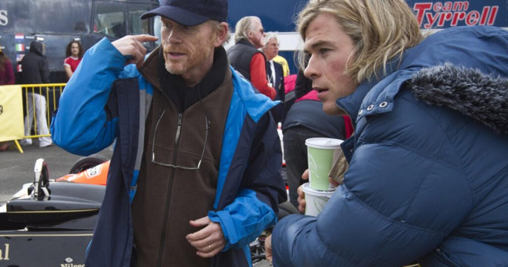 Ron Howard and Chris Hemsworth on the set of Rush (2013)