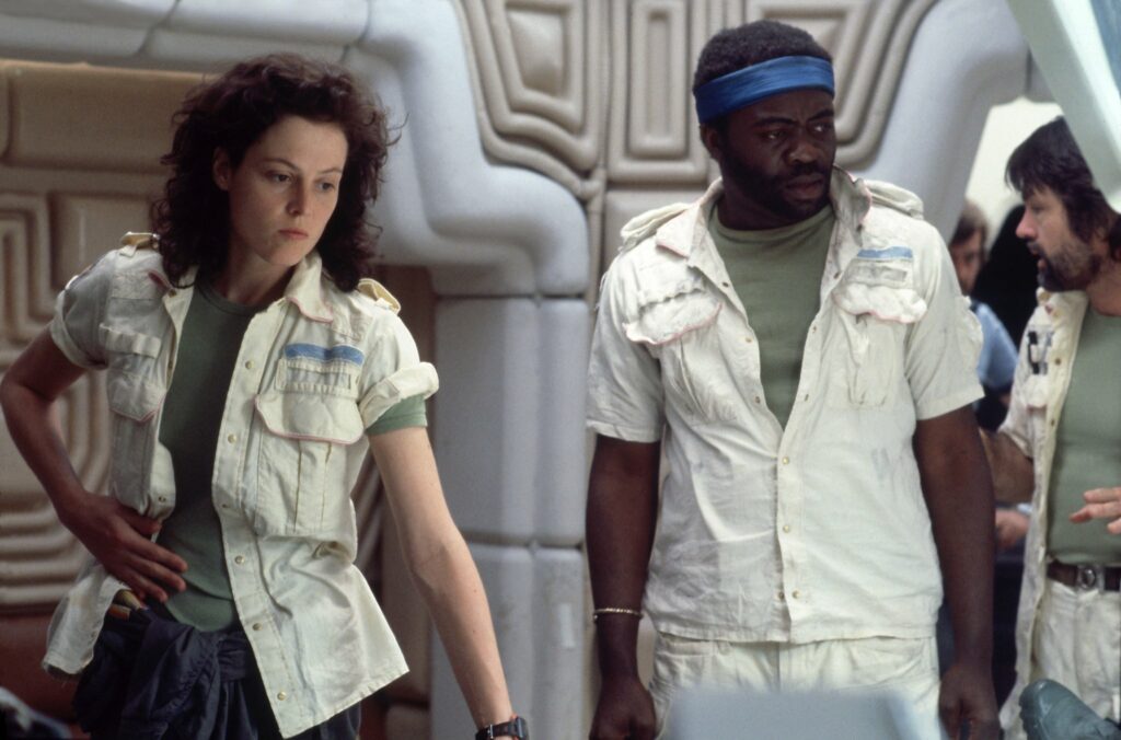Sigourney Weaver and Yaphett Koto in Alien (1979)  directed by Ridley Scott.