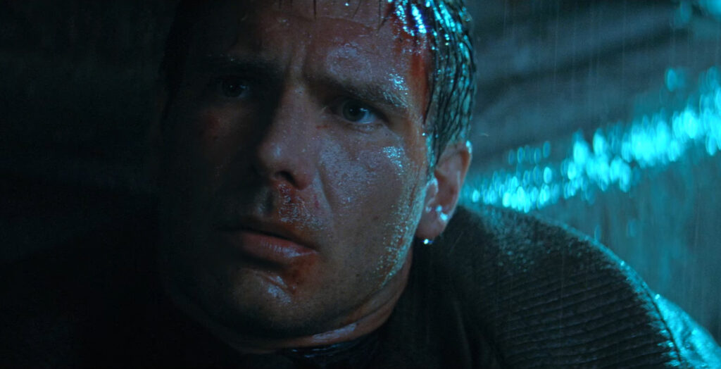 Harrison Ford in Blade Runner (1982) directed Ridley Scott.