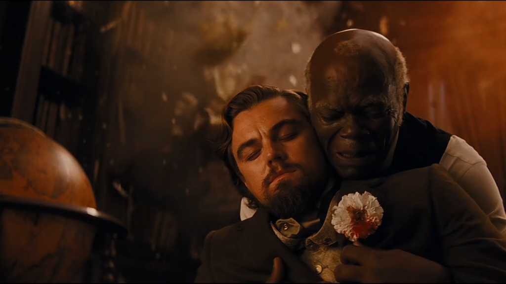 Leonardo DiCario and Samuel L. Jackson in Django Unchained (2012) directed by Quentin Tarantino.