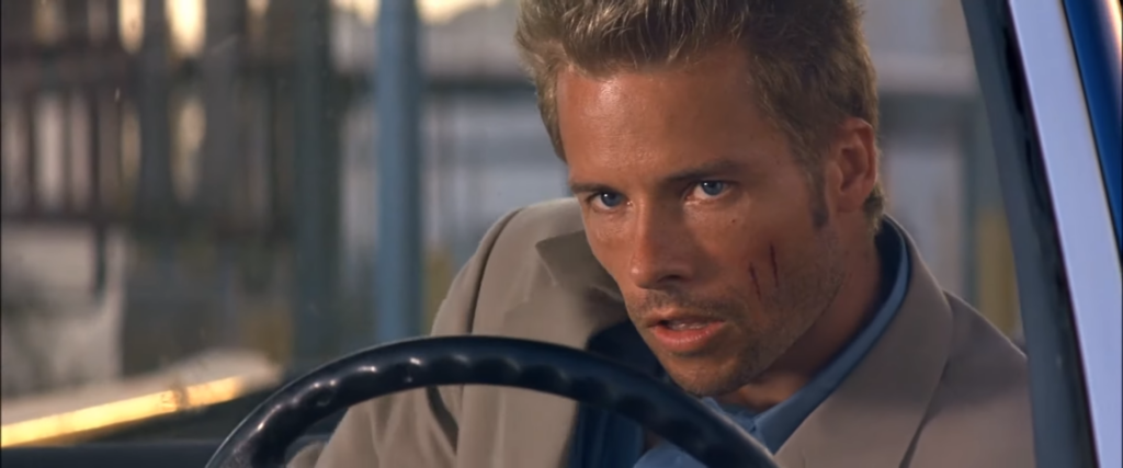 Guy Pearce in Memento (2000) directed by Christopher Nolan.