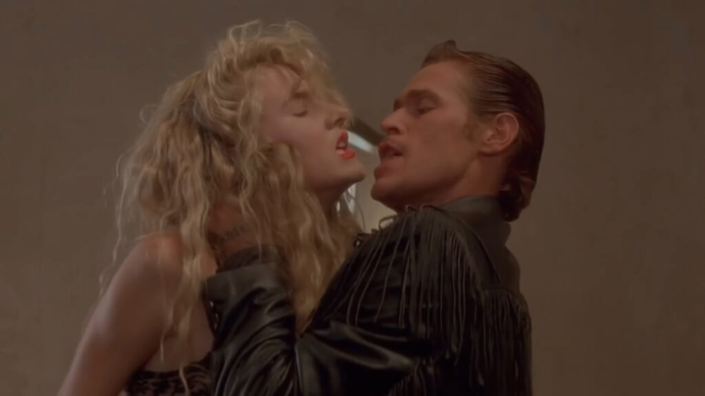 Laura Dern and Willem Dafoe in Wild at Heart (1990) directed by David Lynch.