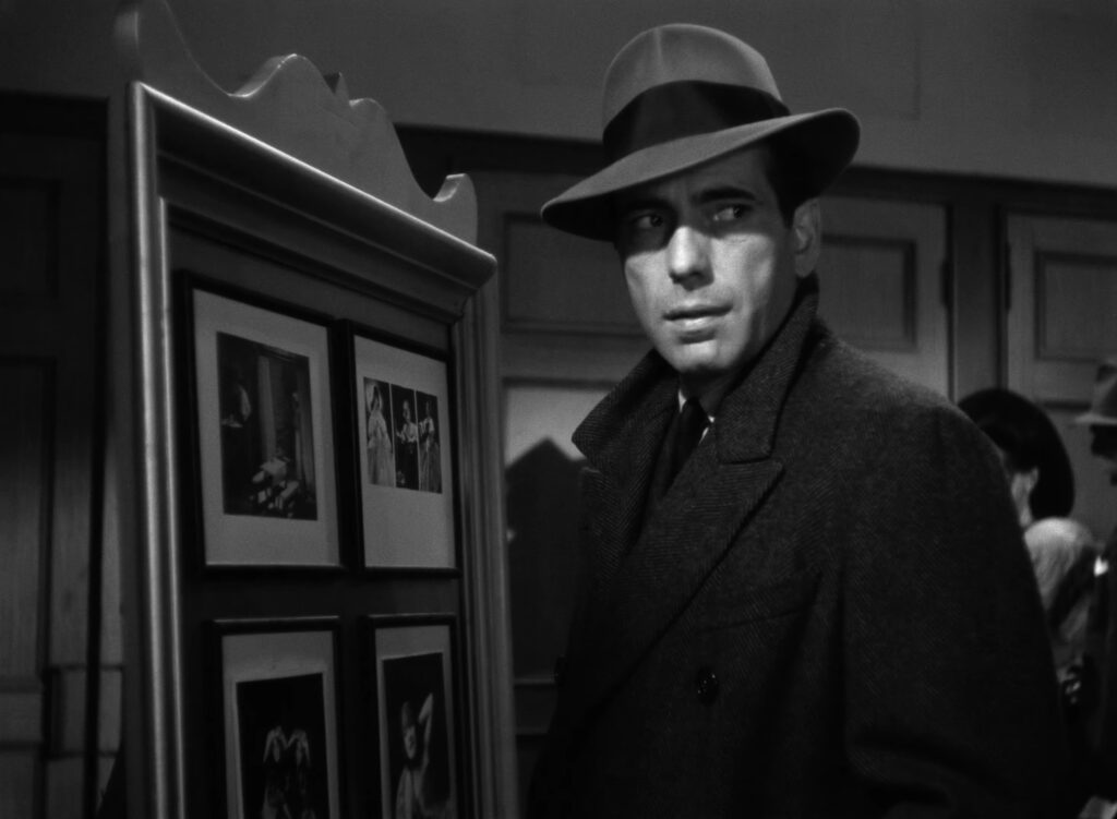 Humphrey Bogart in The Maltese Falcon (1941) directed by John Huston.