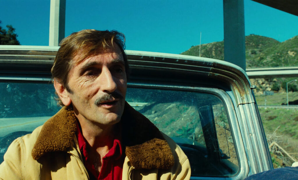 Harry Dean Stanton in Paris, Texas (1984) directed by Wim Wenders.