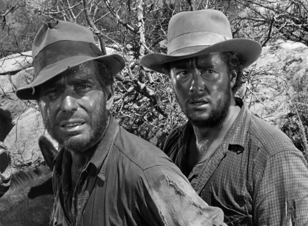 Humphrey Bogart and Tim Holt in The Treasure of the Sierra Madre (1948) directed by John Huston.