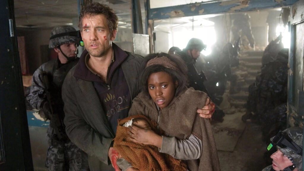 Clive Owen as Theo and Clare-Hope Ashitey as Kee in Children of Men (2006)