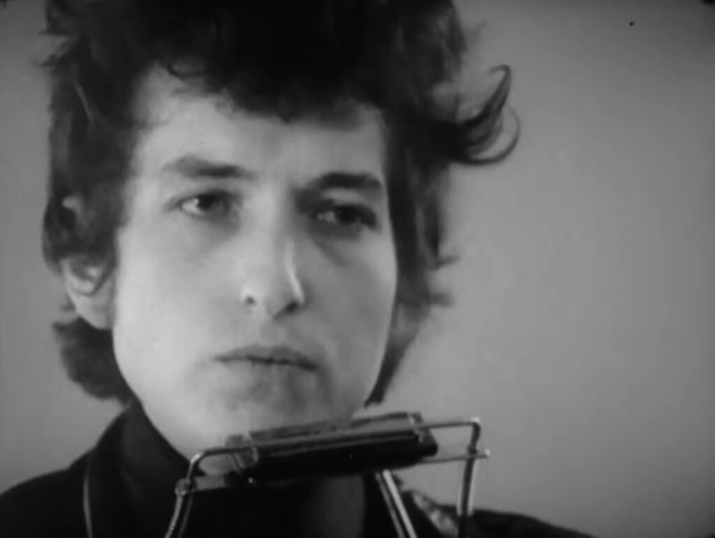 Bob Dylan in a scene from D. A. Pennebaker's Don't Look Back (1967)