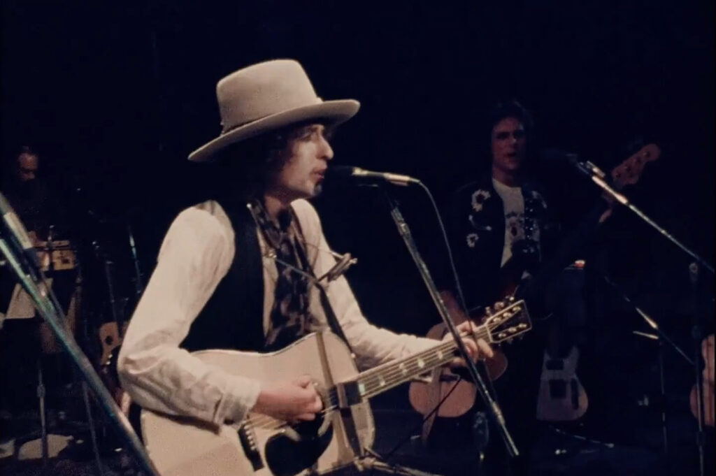Dylan in mid-song - a scene from Rolling Thunder Revue: A Bob Dylan Story (2019)