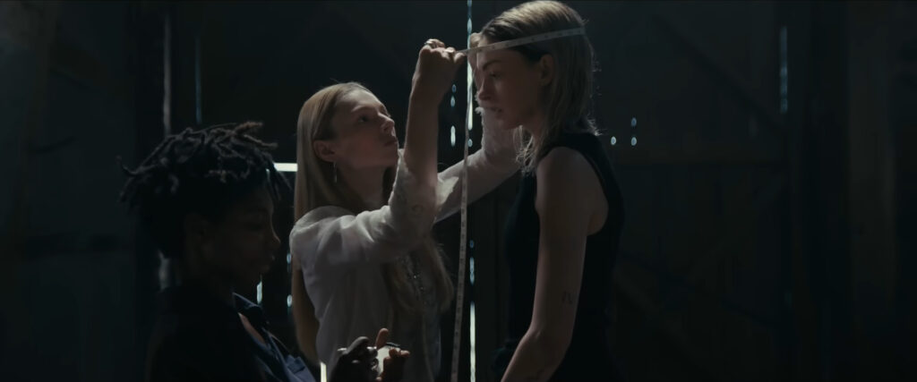 Michaela Cole, Hunter Schafer and Anne Hathaway in Mother Mary (2026)