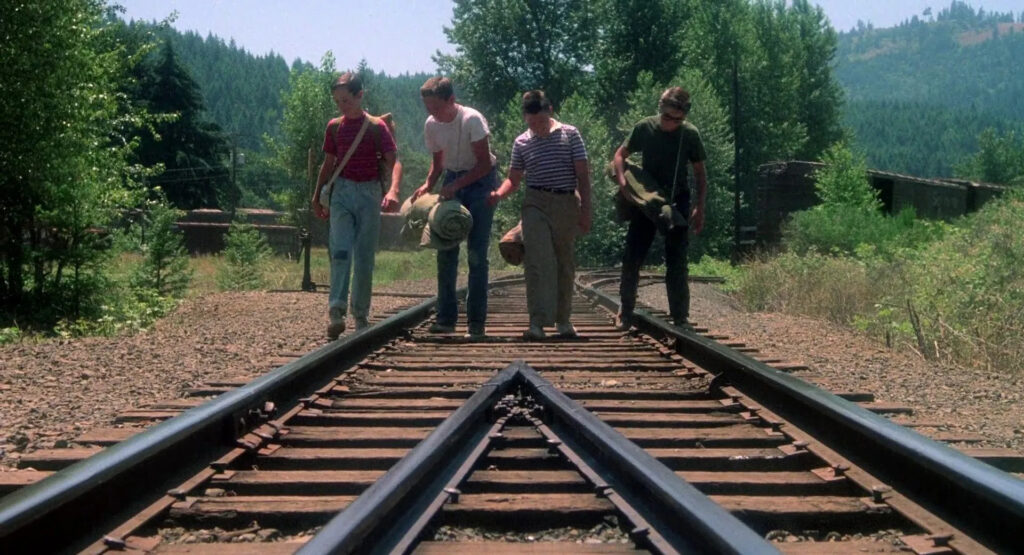 Wil Wheaton, River Phoenix, Jerry O'Connell and Corey Feldman in Stand by Me (1986) directed by Rob Reiner
