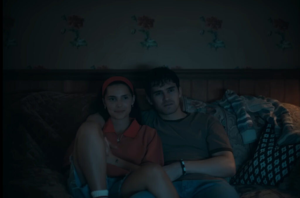Nikki and Bear watch TV in Obsession (2025)