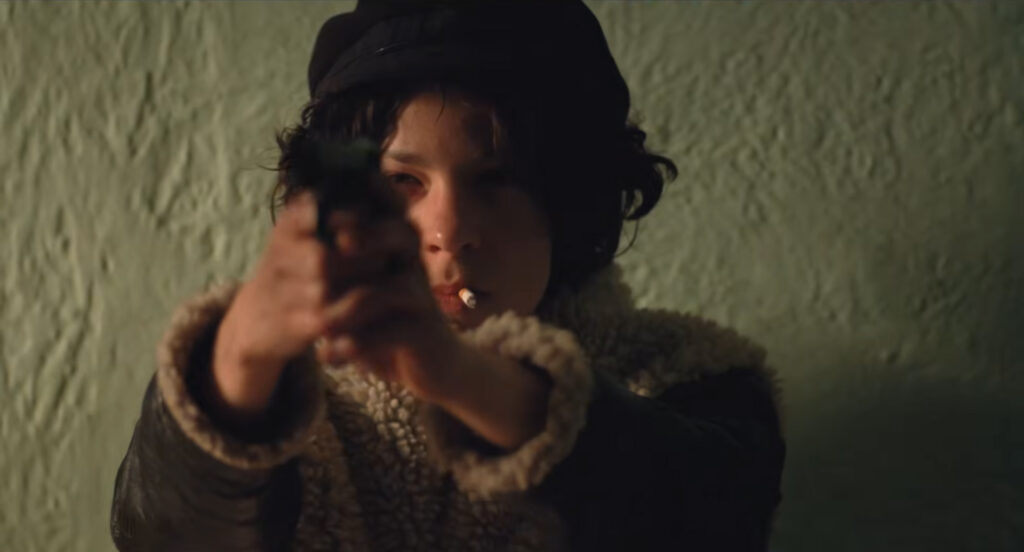 Valerie Solanas aims her pistol in I Shot Andy Warhol (1996)