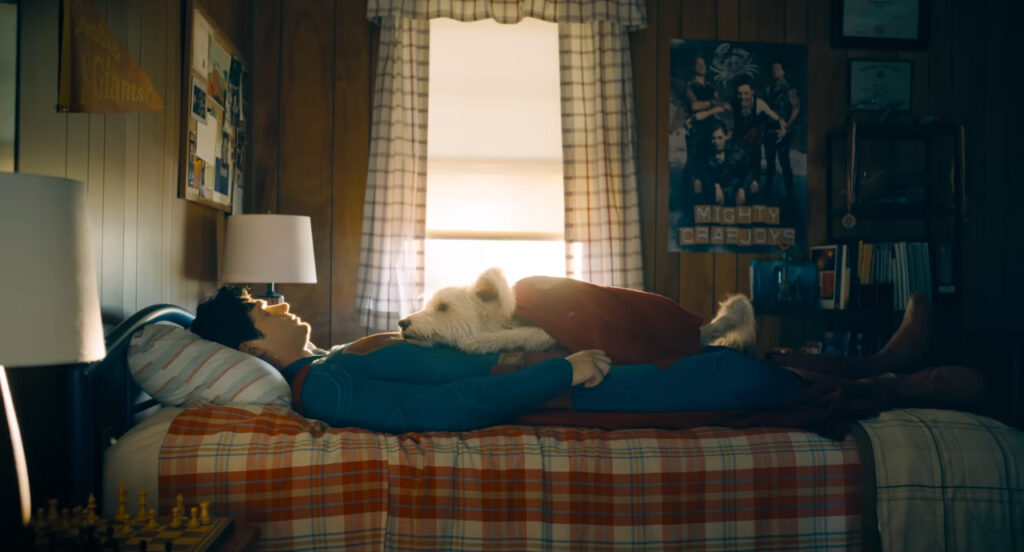 Superman and Krypto relaxing in Superman (2025)